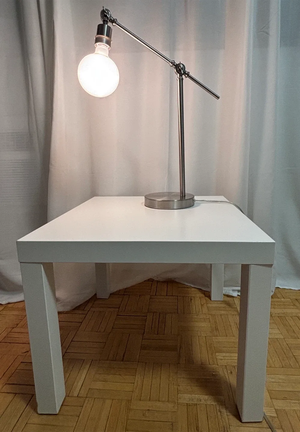 Stylish Silver Desk Lamp and IKEA Bedside Table