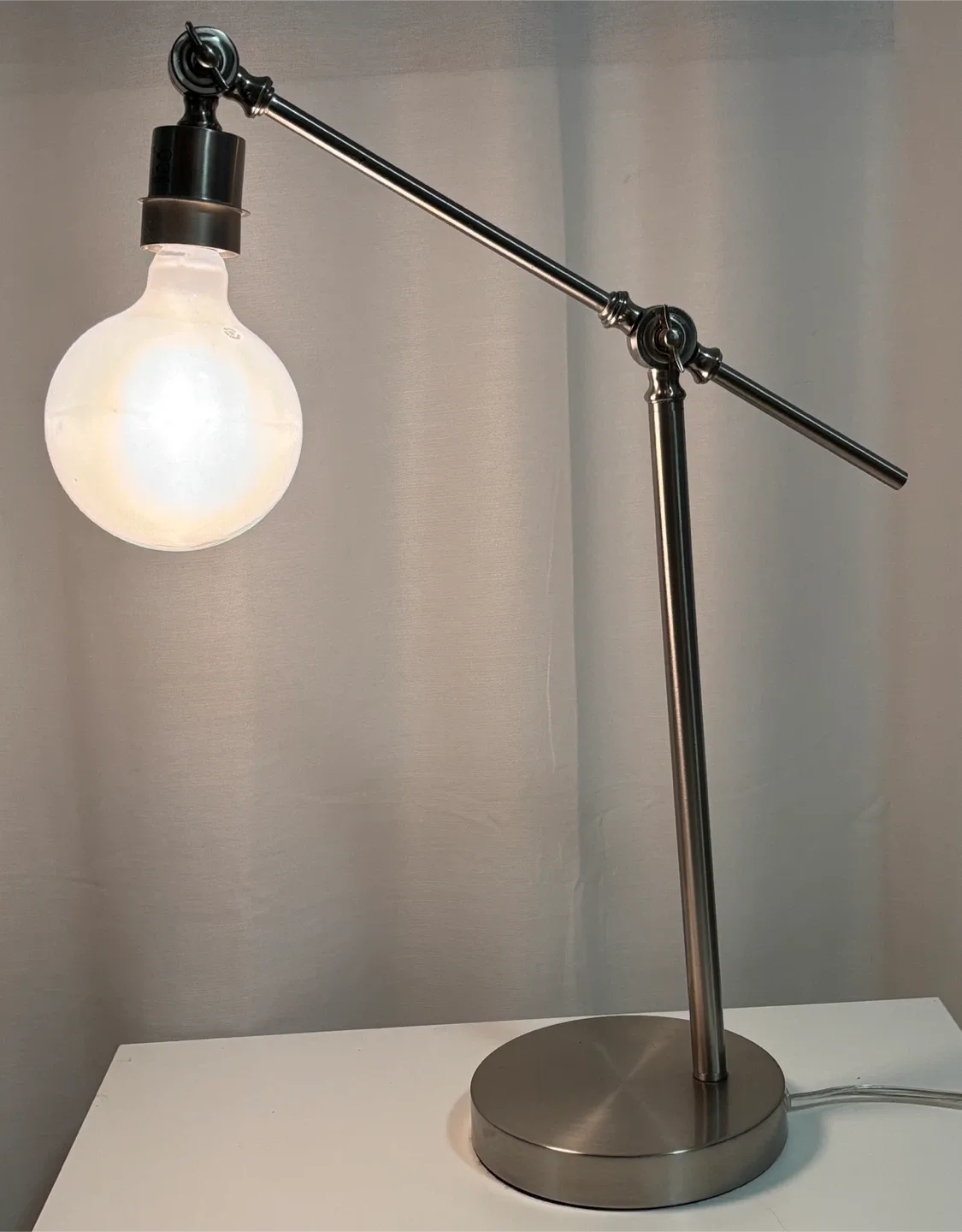 Stylish Silver Desk Lamp and IKEA Bedside Table image indicator(4)