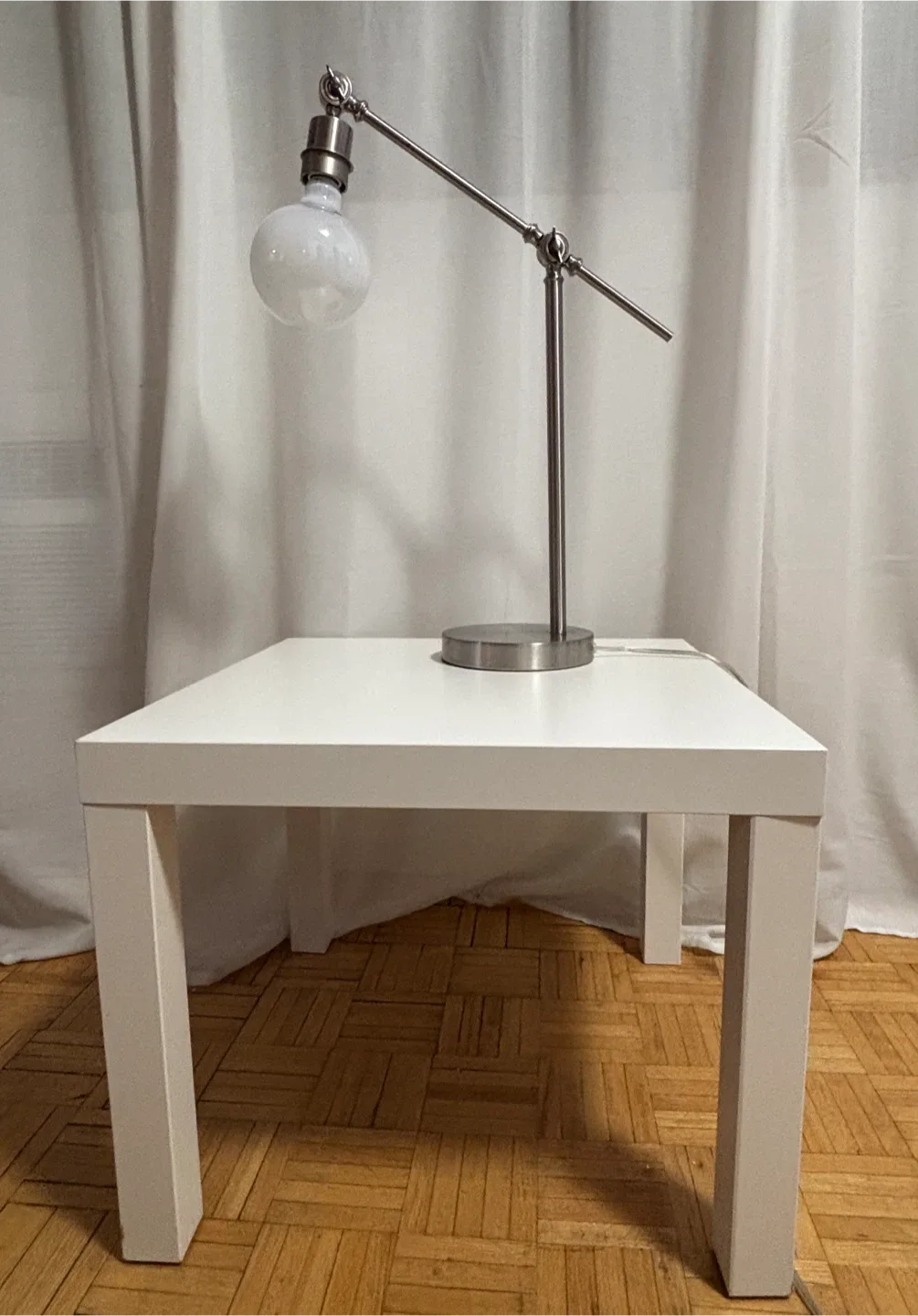 Stylish Silver Desk Lamp and IKEA Bedside Table image indicator(3)