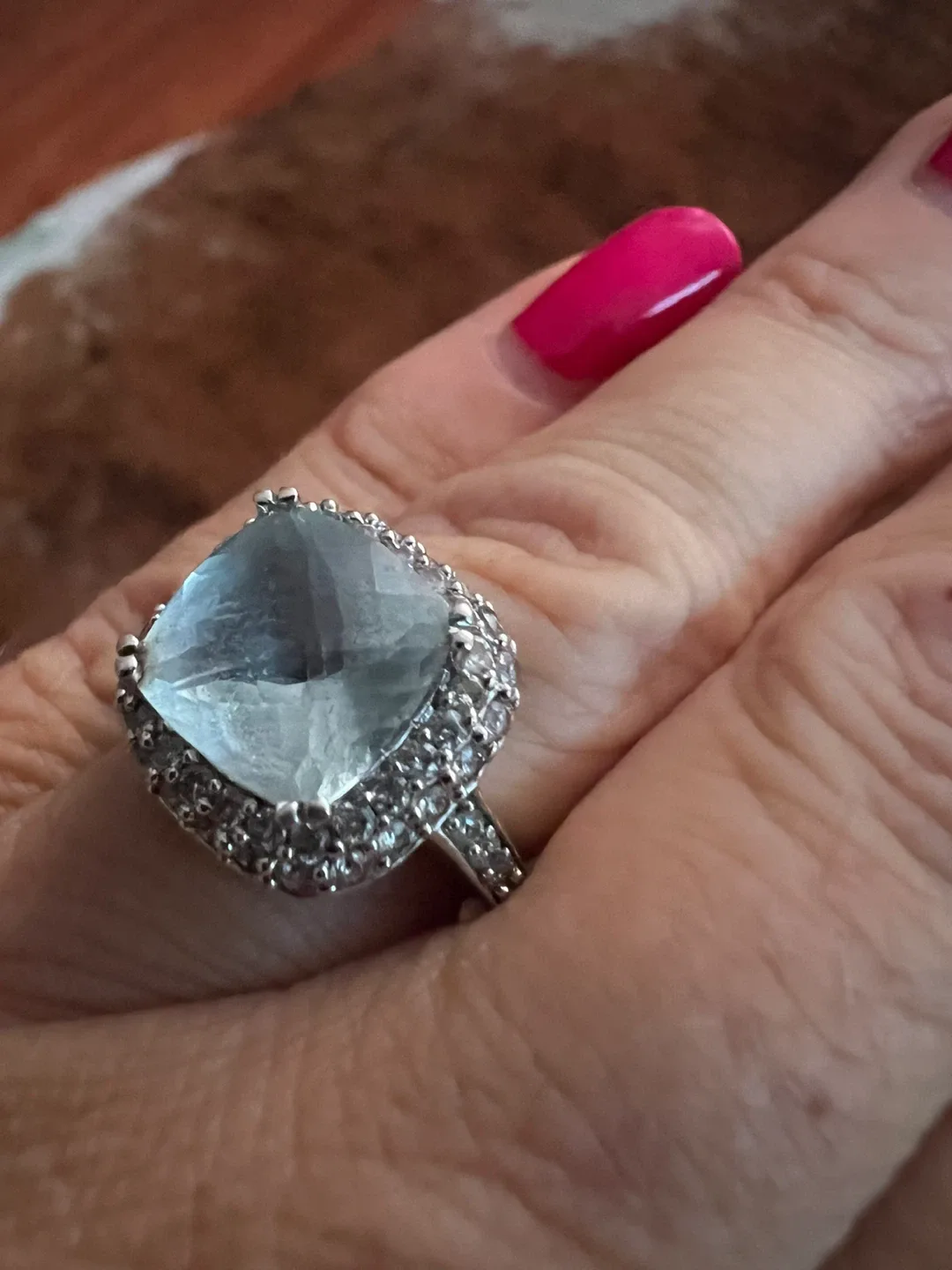 14 k  Ring with Large aquamarine and diamonds