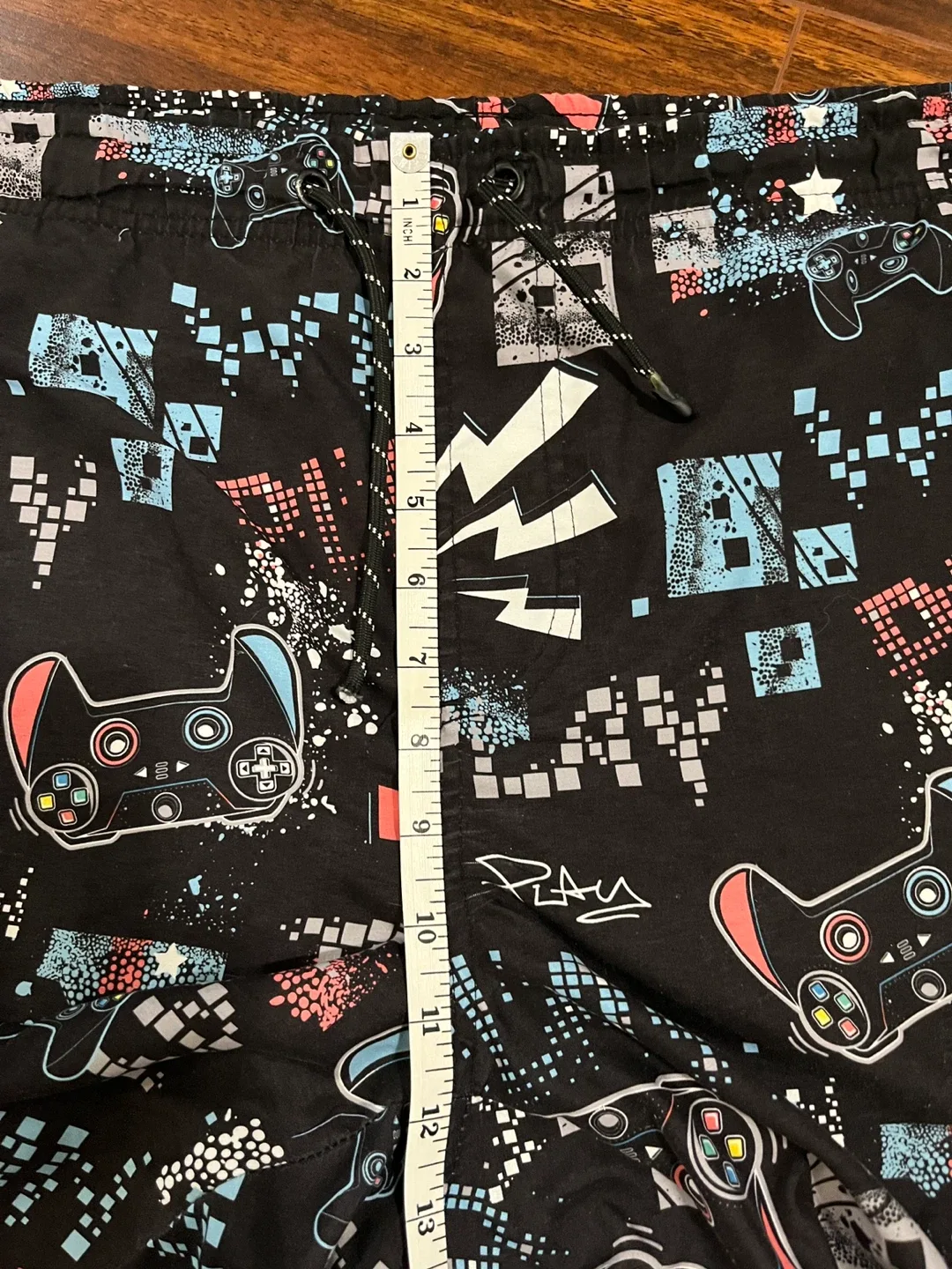 Texfit men’s medium swimming trunks, gaming, black image indicator(6)