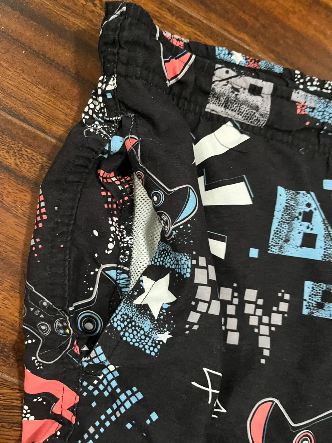 Texfit men’s medium swimming trunks, gaming, black image indicator(7)