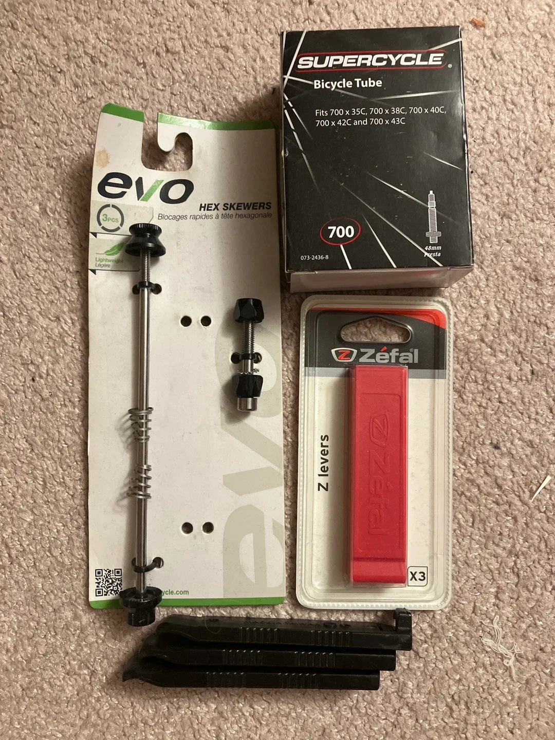 Bicycle Repair items: EVO Skewers, Supercycle Tube, Zefal Levers