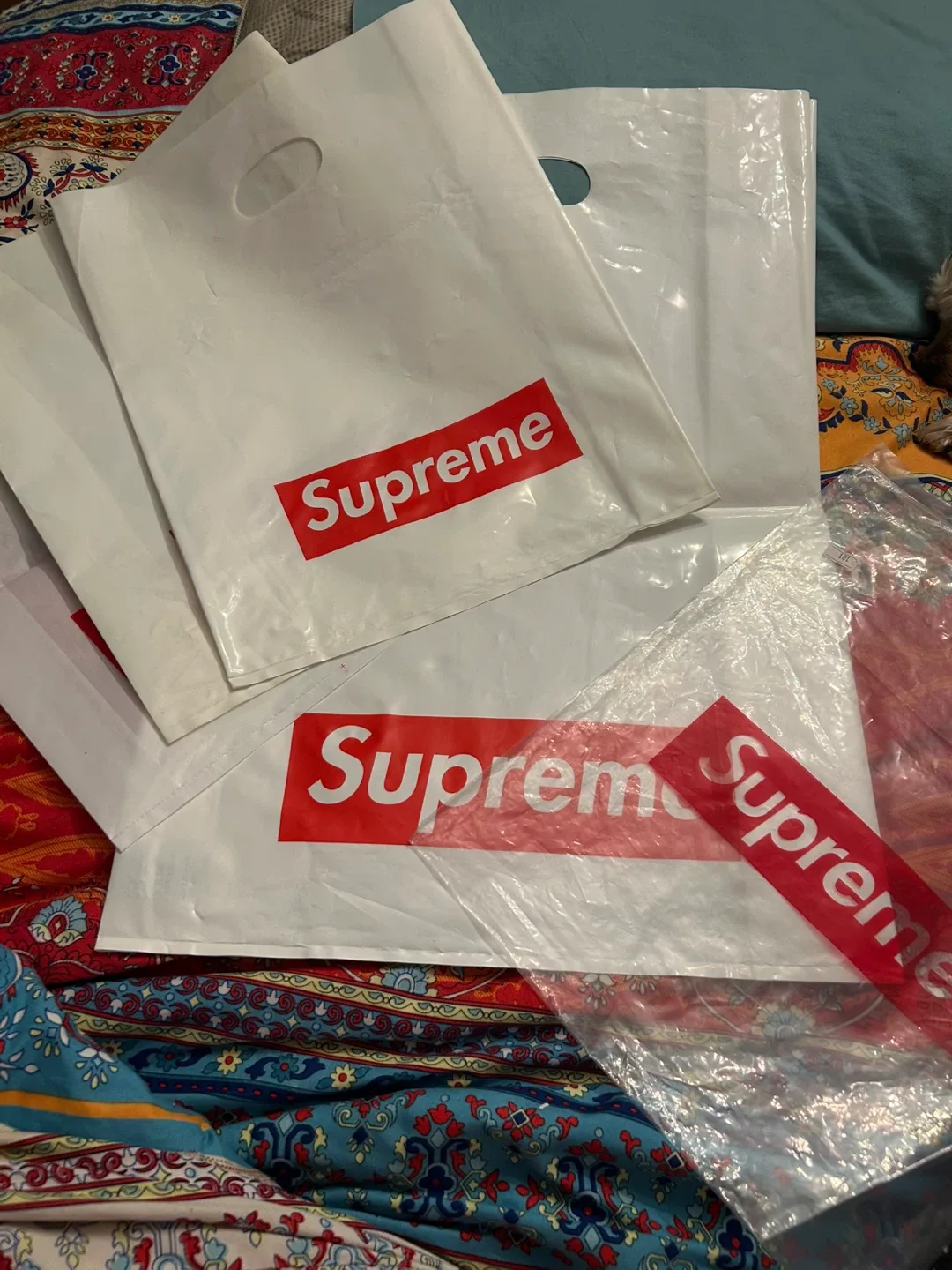Supreme branded white plastic shopping bags