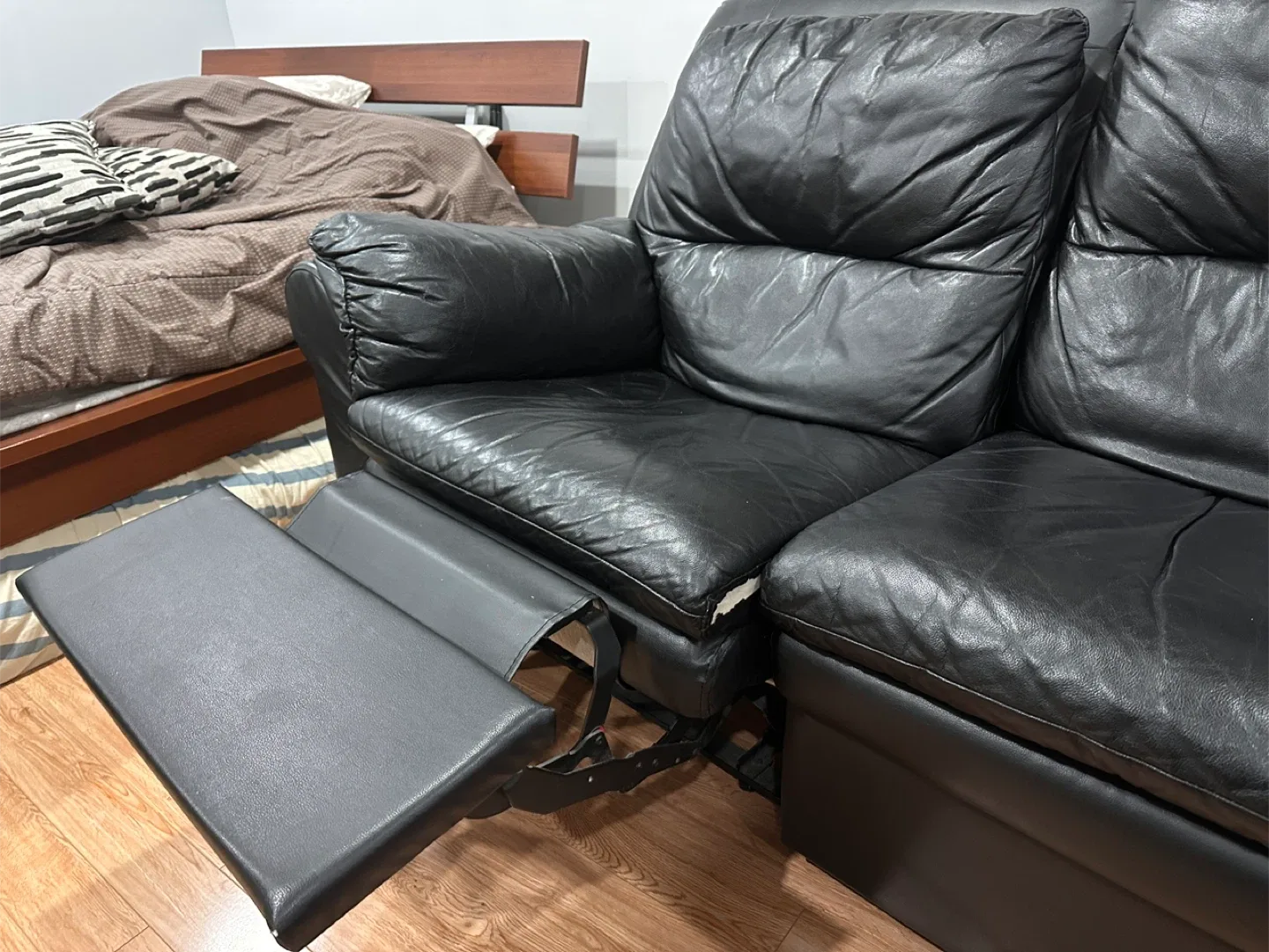 Black Leather Reclining Loveseat
