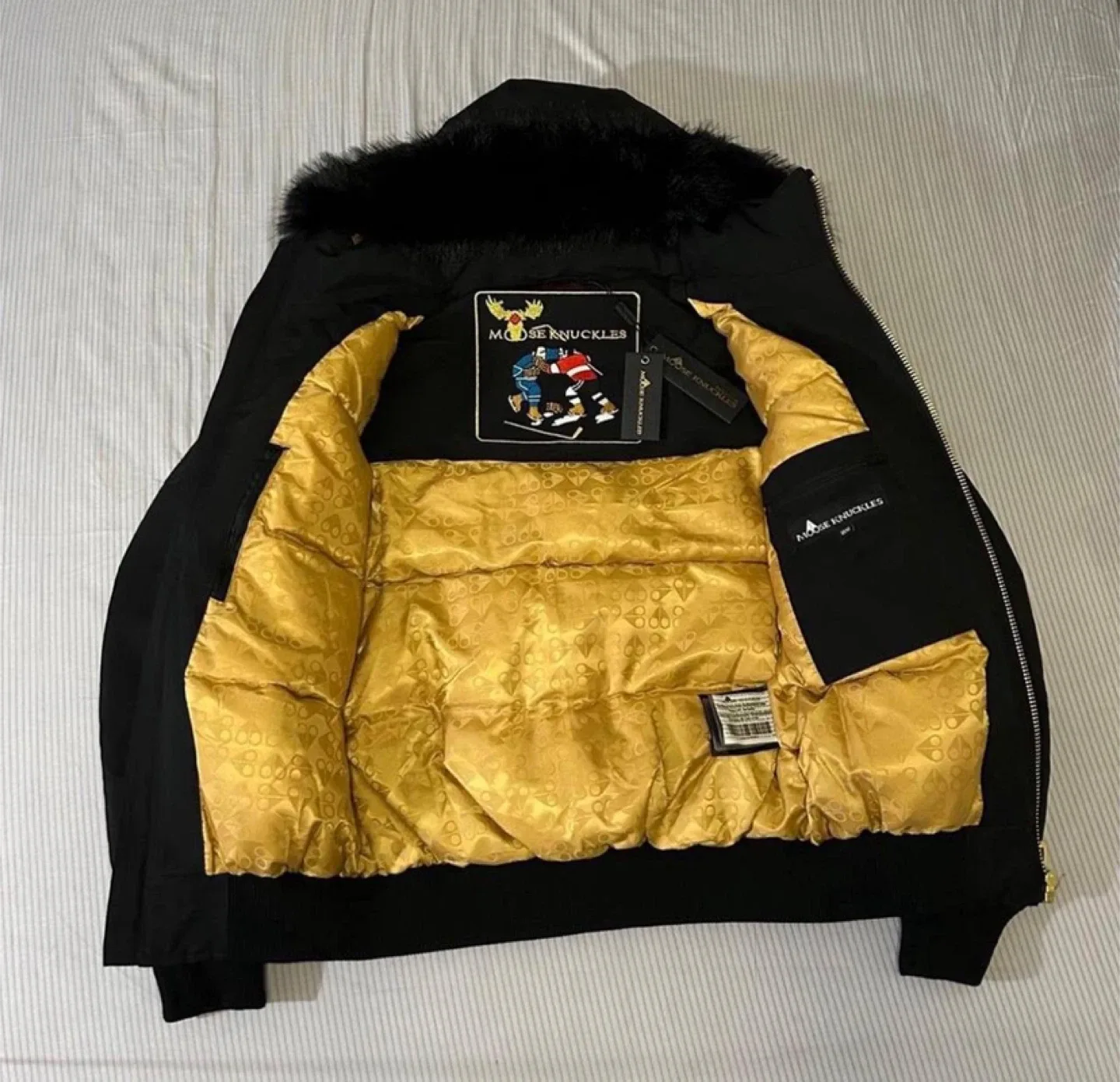 Moose Knuckles Black/Gold Down-Filled Fur Bomber Jacket - NWT image indicator(2)