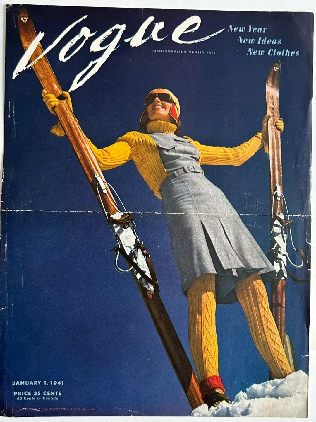 1941 vintage cover vogue showing woman skiing art sports