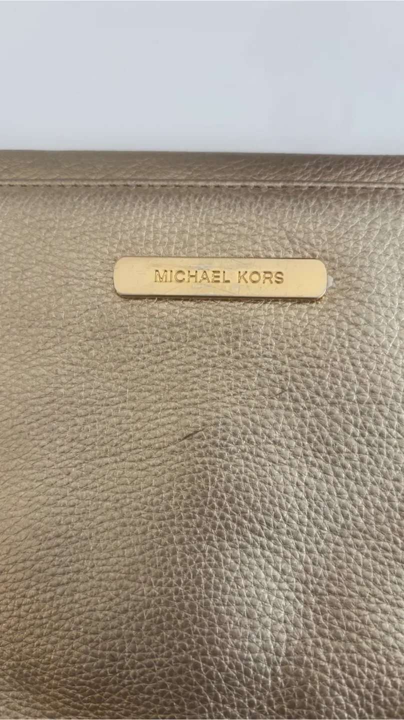 Michael Kors Metallic Gold Clutch image indicator(4)