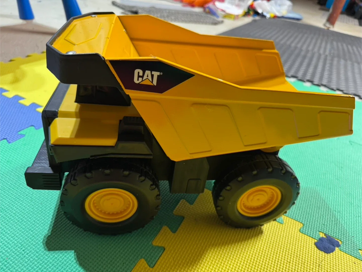 #Cleanout CAT Dump Truck Toy - Yellow