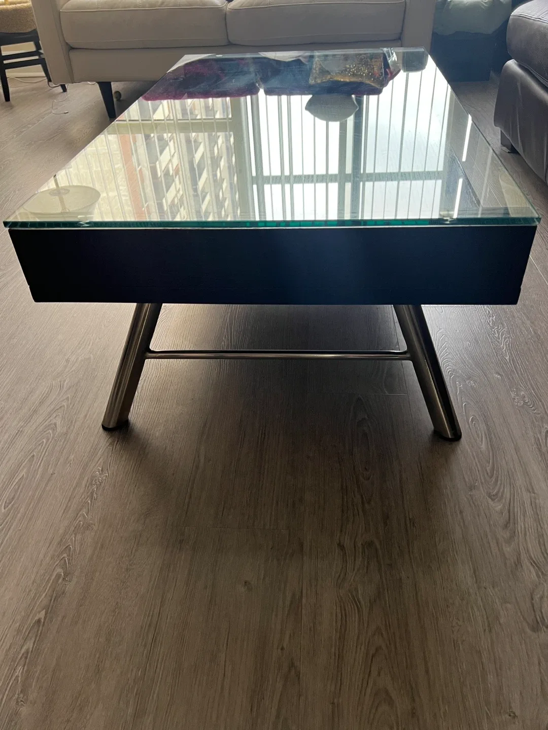 Sleek Black Coffee Table with Glass Display Shelf image indicator(4)