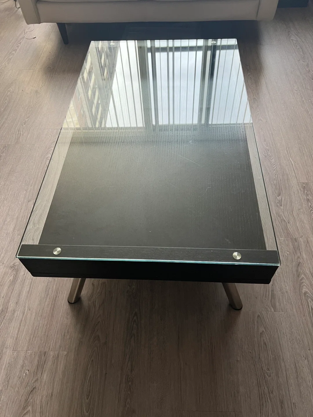 Sleek Black Coffee Table with Glass Display Shelf image indicator(2)