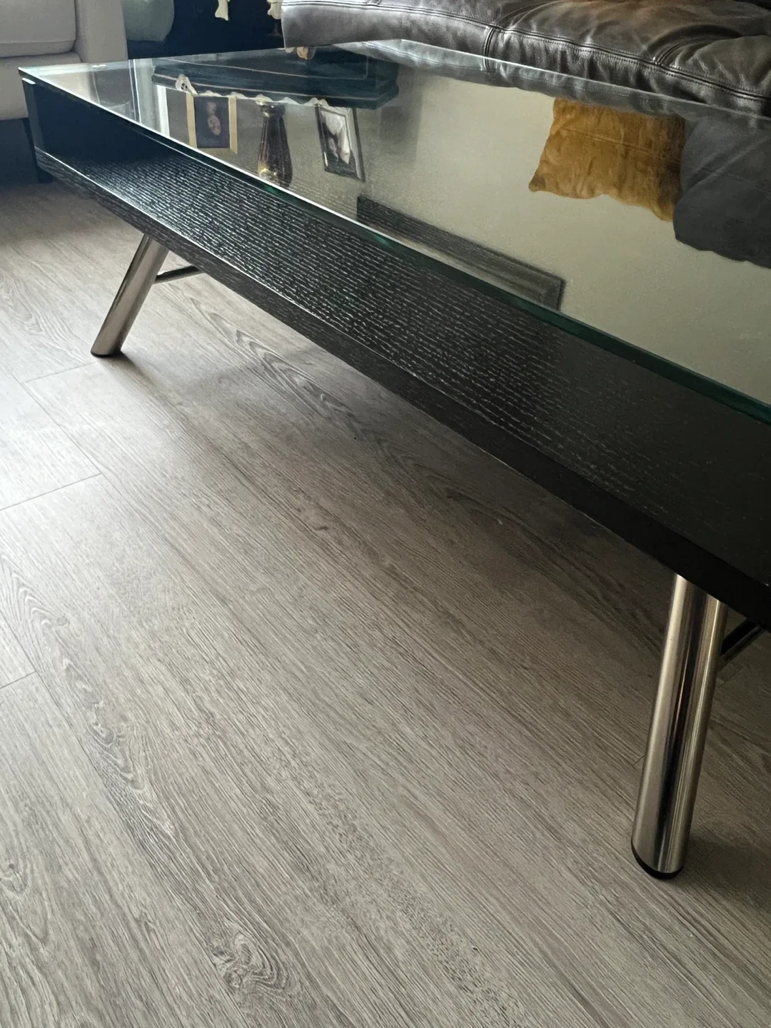 Sleek Black Coffee Table with Glass Display Shelf image indicator(3)