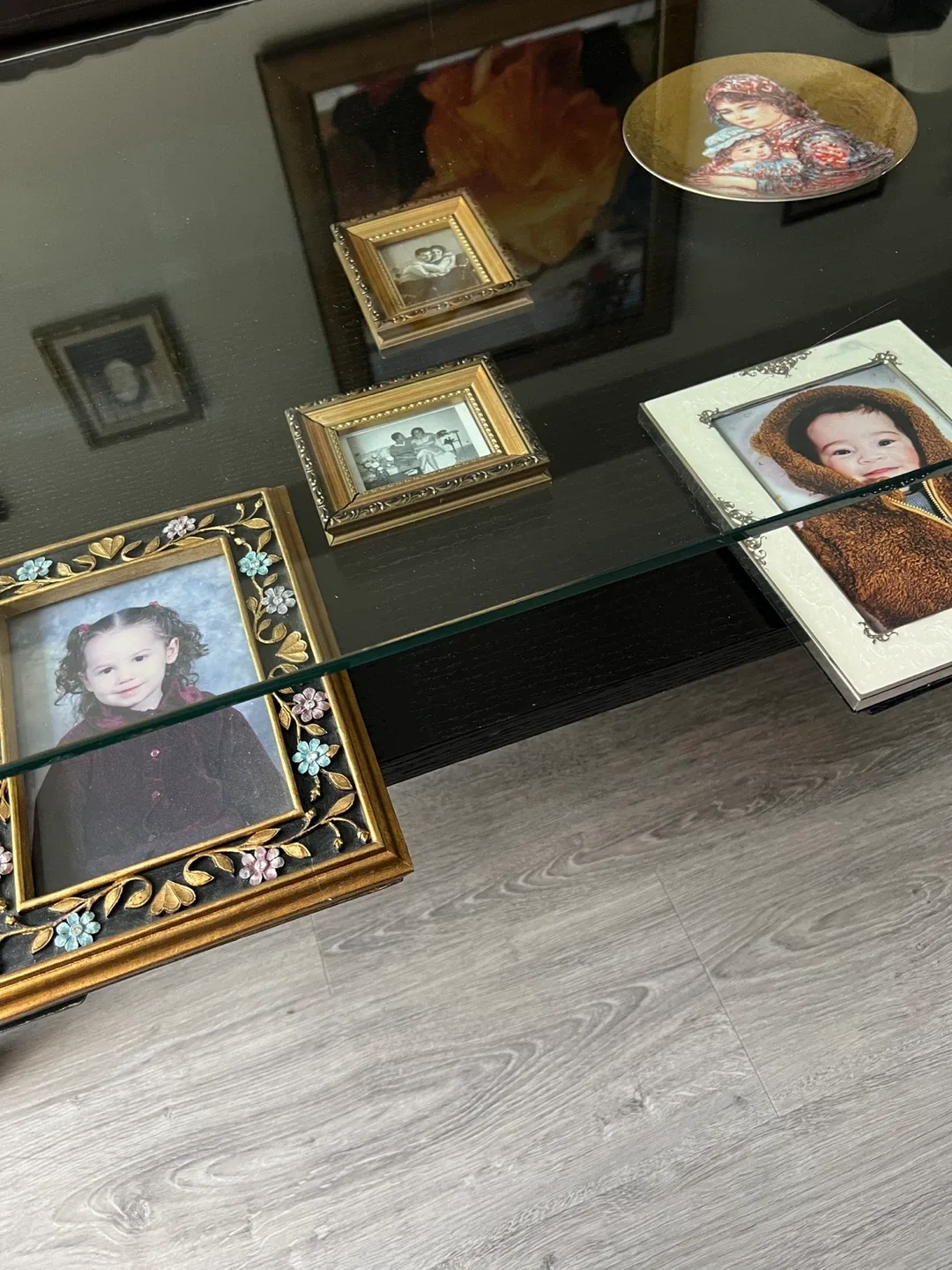 Sleek Black Coffee Table with Glass Display Shelf image indicator(5)