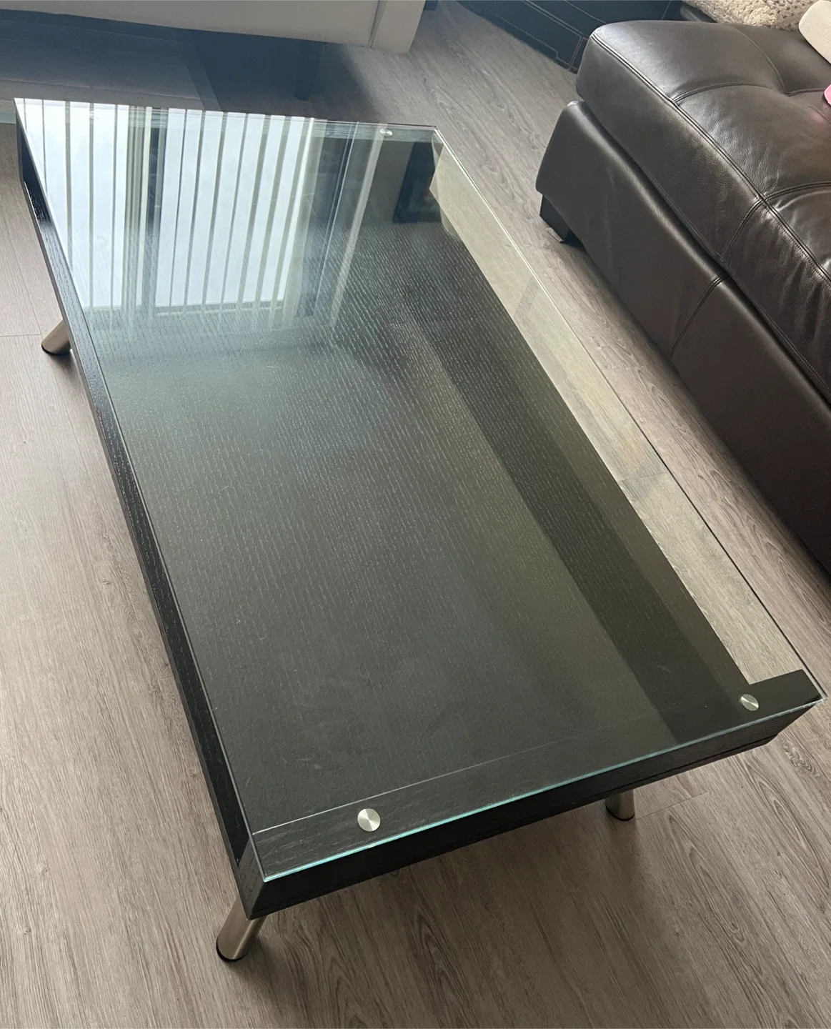 Sleek Black Coffee Table with Glass Display Shelf