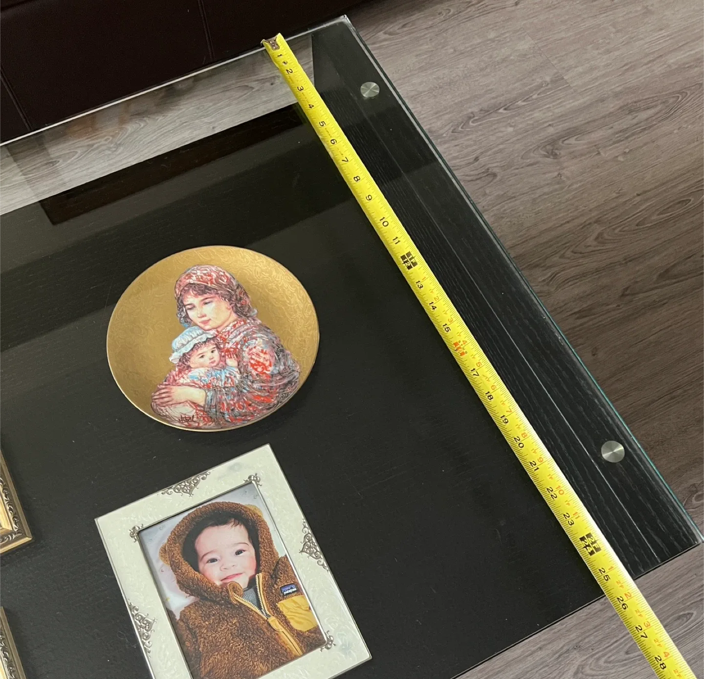 Sleek Black Coffee Table with Glass Display Shelf image indicator(9)