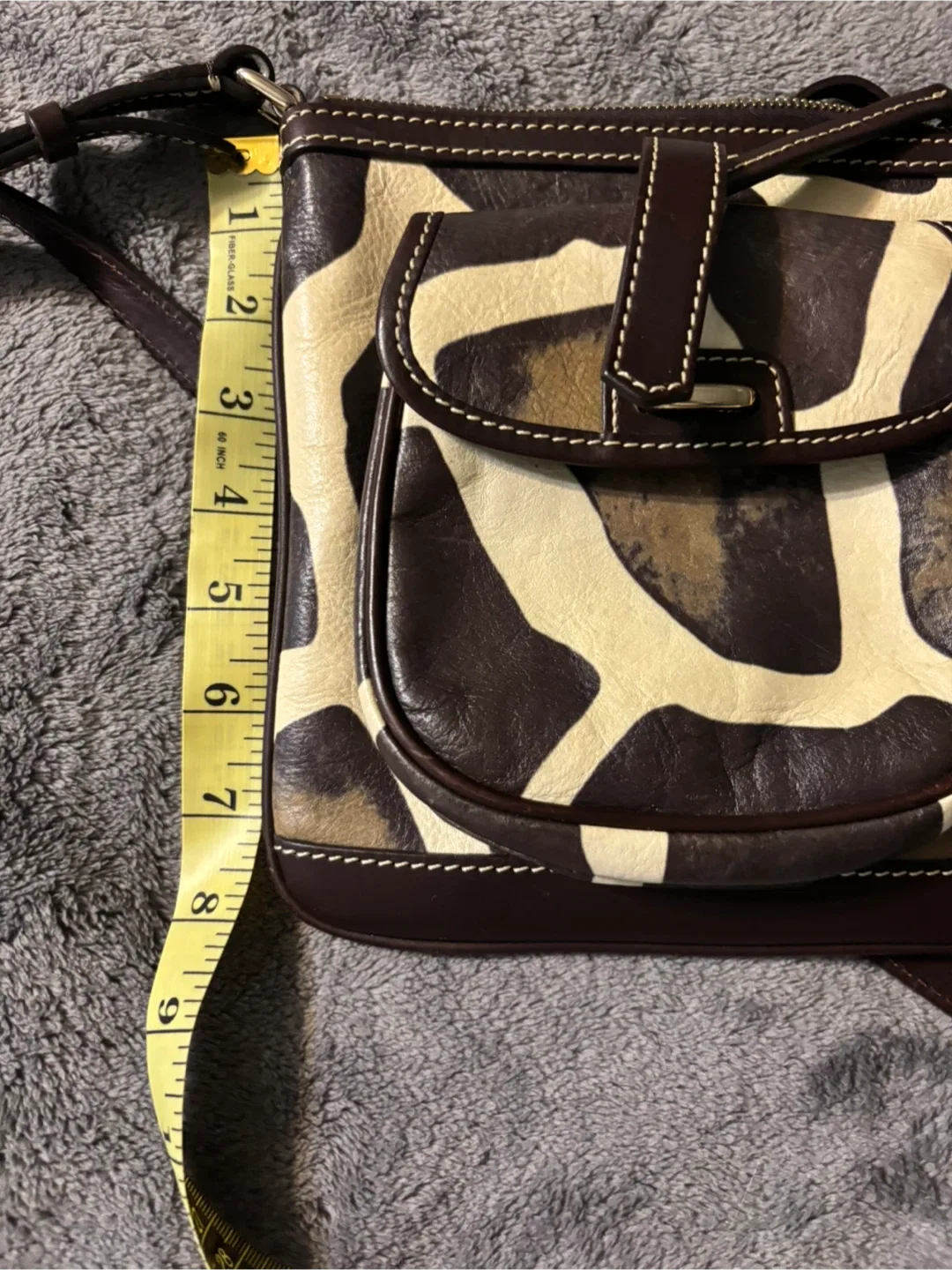 Dooney & Bourke Giraffe Print Crossbody Bag image indicator(9)