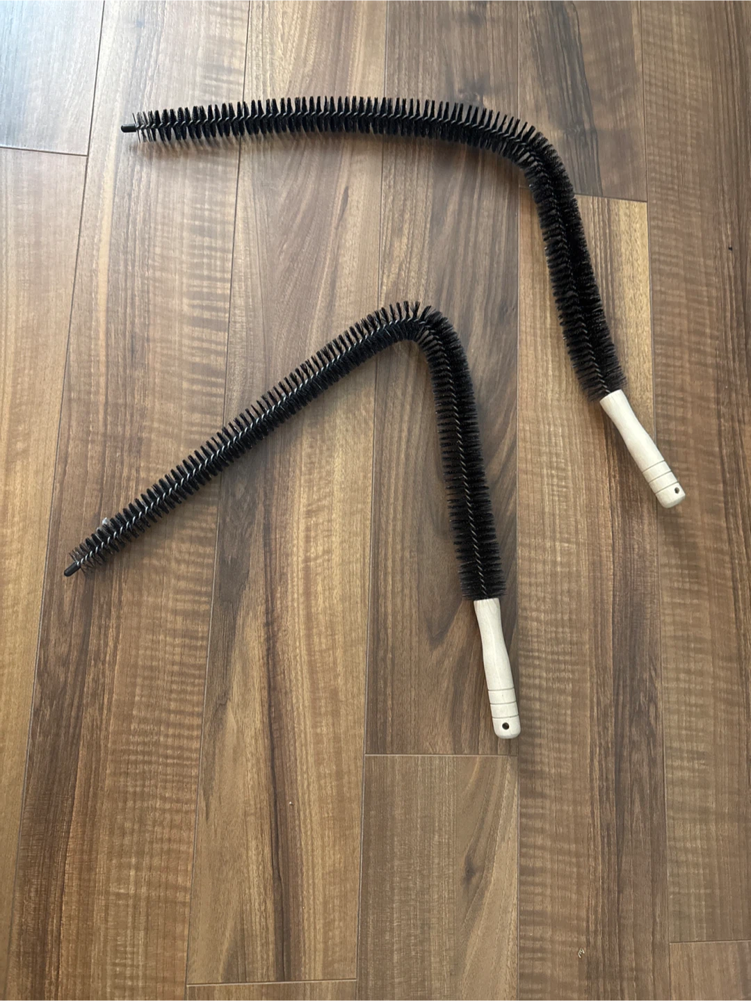 Two Black Dryer Vent Brushes