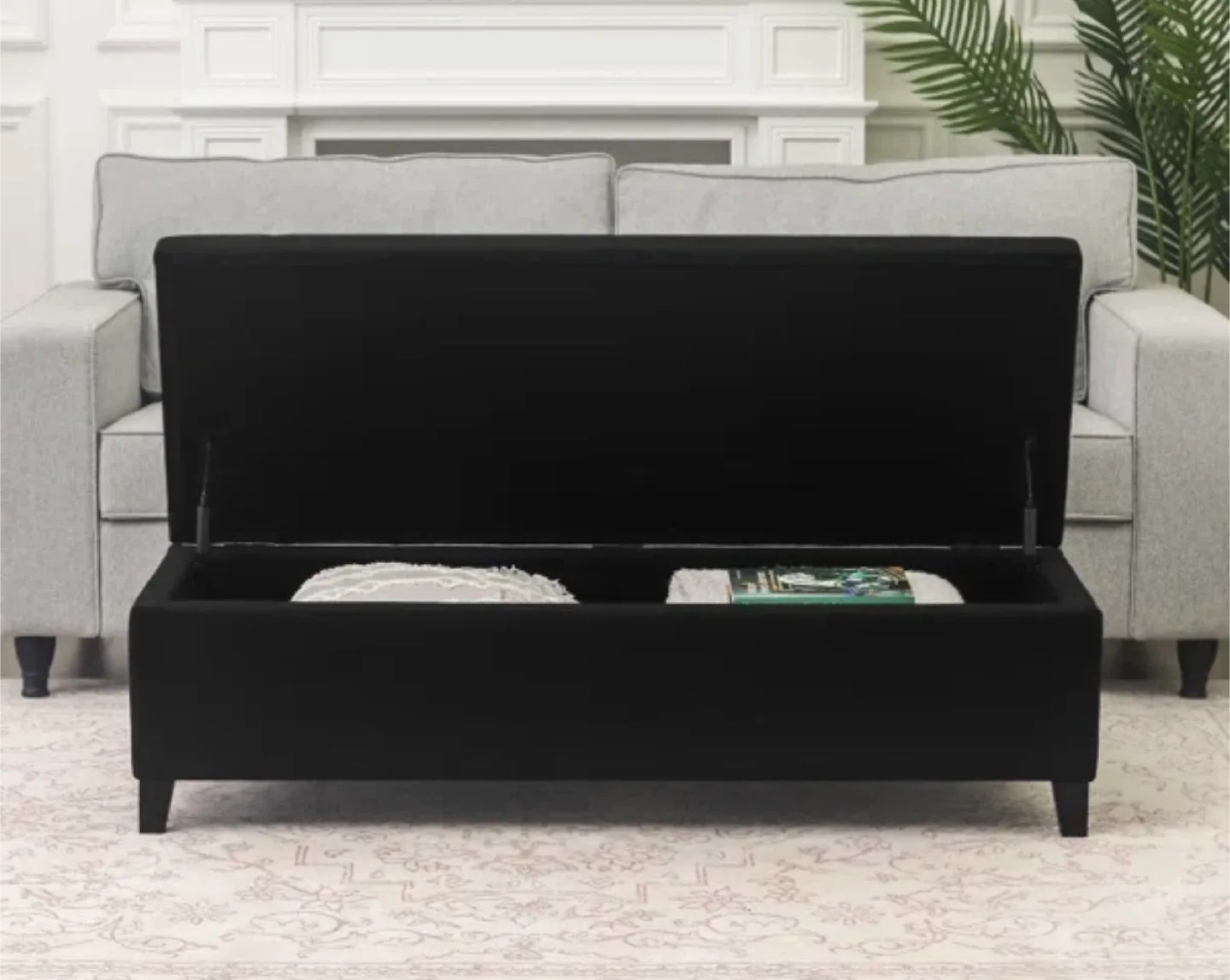 Black upholstered storage ottoman bench