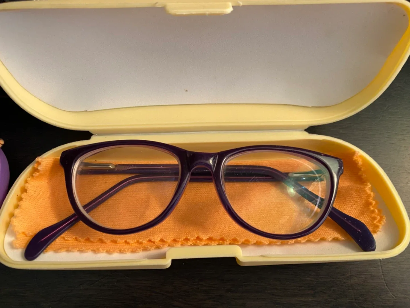 Two Pairs of Glasses - Black and Purple Frames image indicator(2)