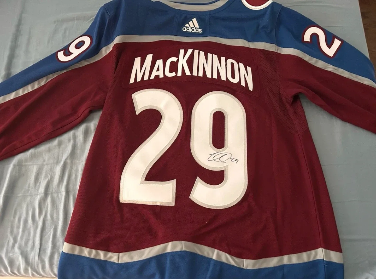 Signed Nathan MacKinnon jersey with COA
