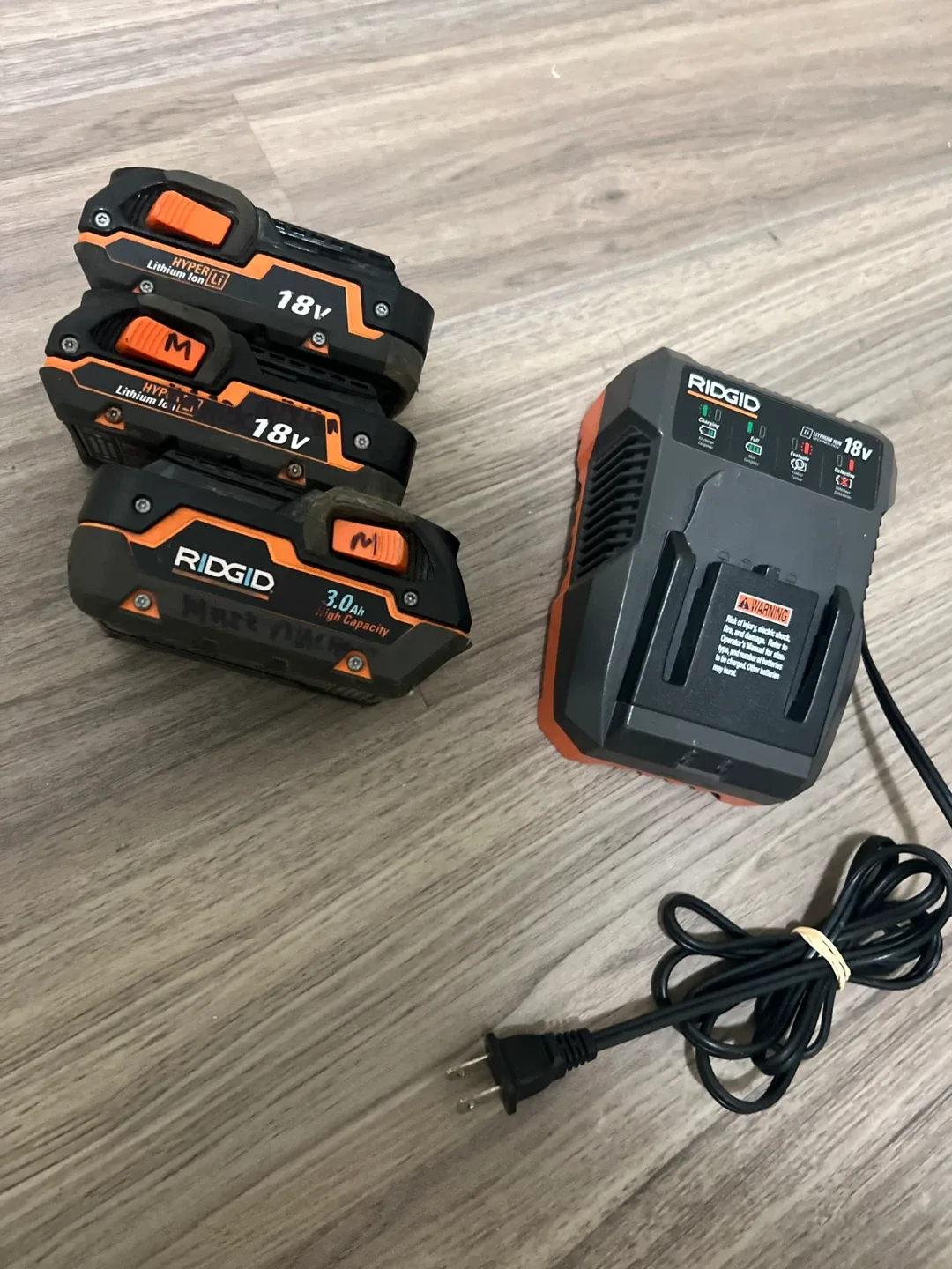 Ridgid- Charger/Lithium Ion Batteries