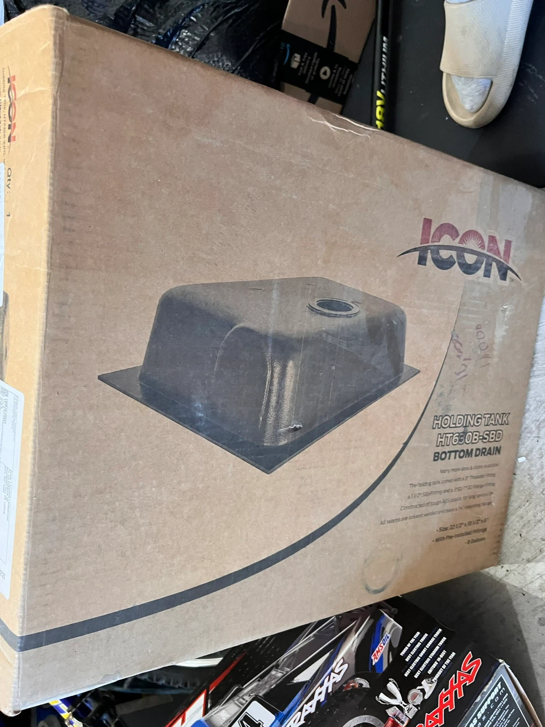 Holding tank for shower stall