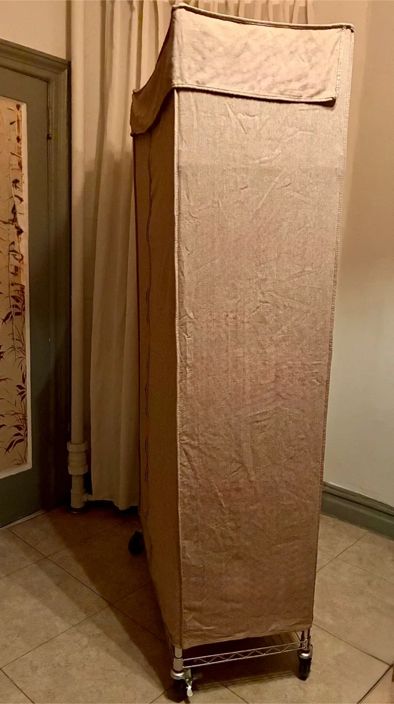 Chrome Rolling Garment Rack image indicator(7)