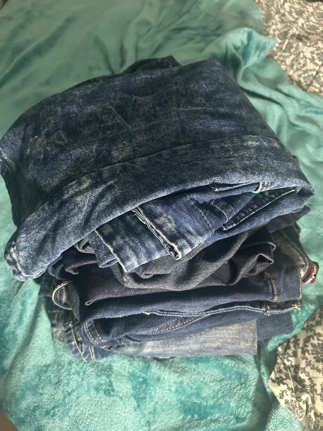 9 pair Stack of Denim Jeans