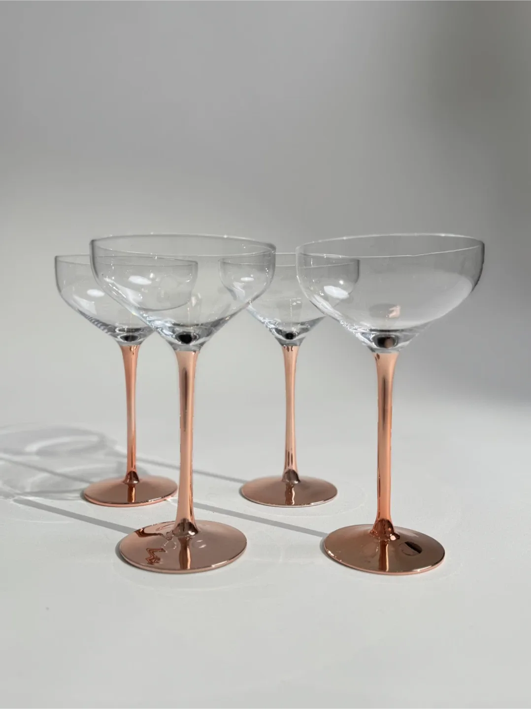 Set of 4 Coupe Glasses, Rose Gold Mirror Stem #Cleanout image indicator(6)