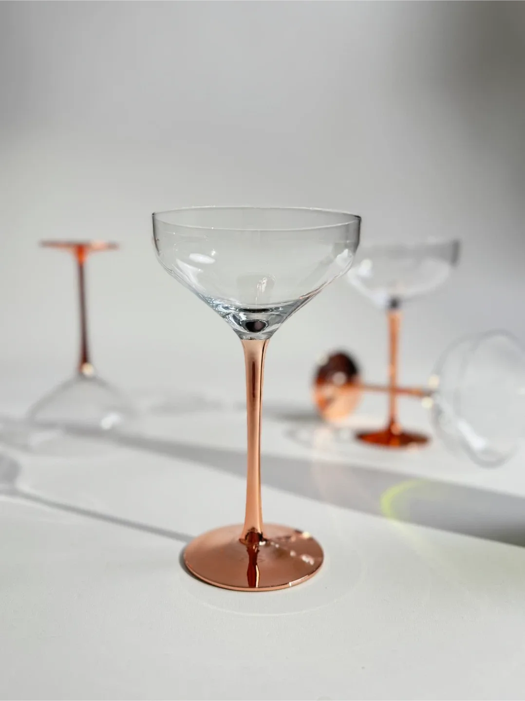 Set of 4 Coupe Glasses, Rose Gold Mirror Stem #Cleanout image indicator(8)