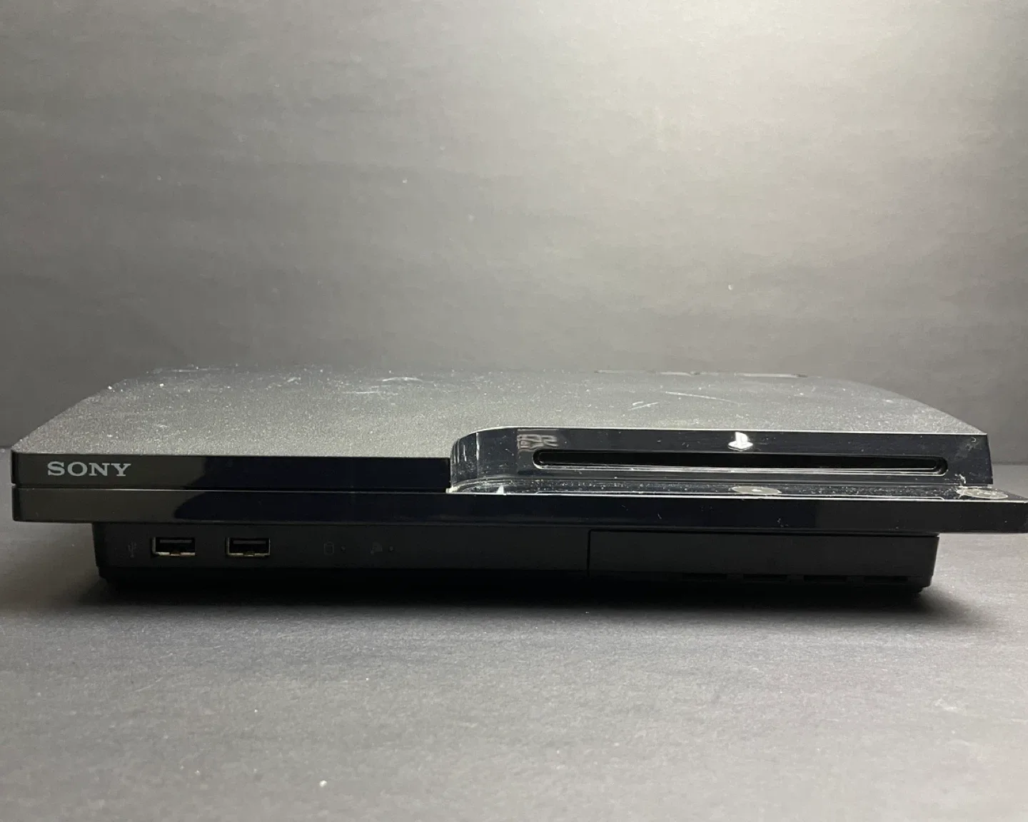 Sony PlayStation 3 (PS3) Console with 5 Games & 2 Controllers image indicator(2)