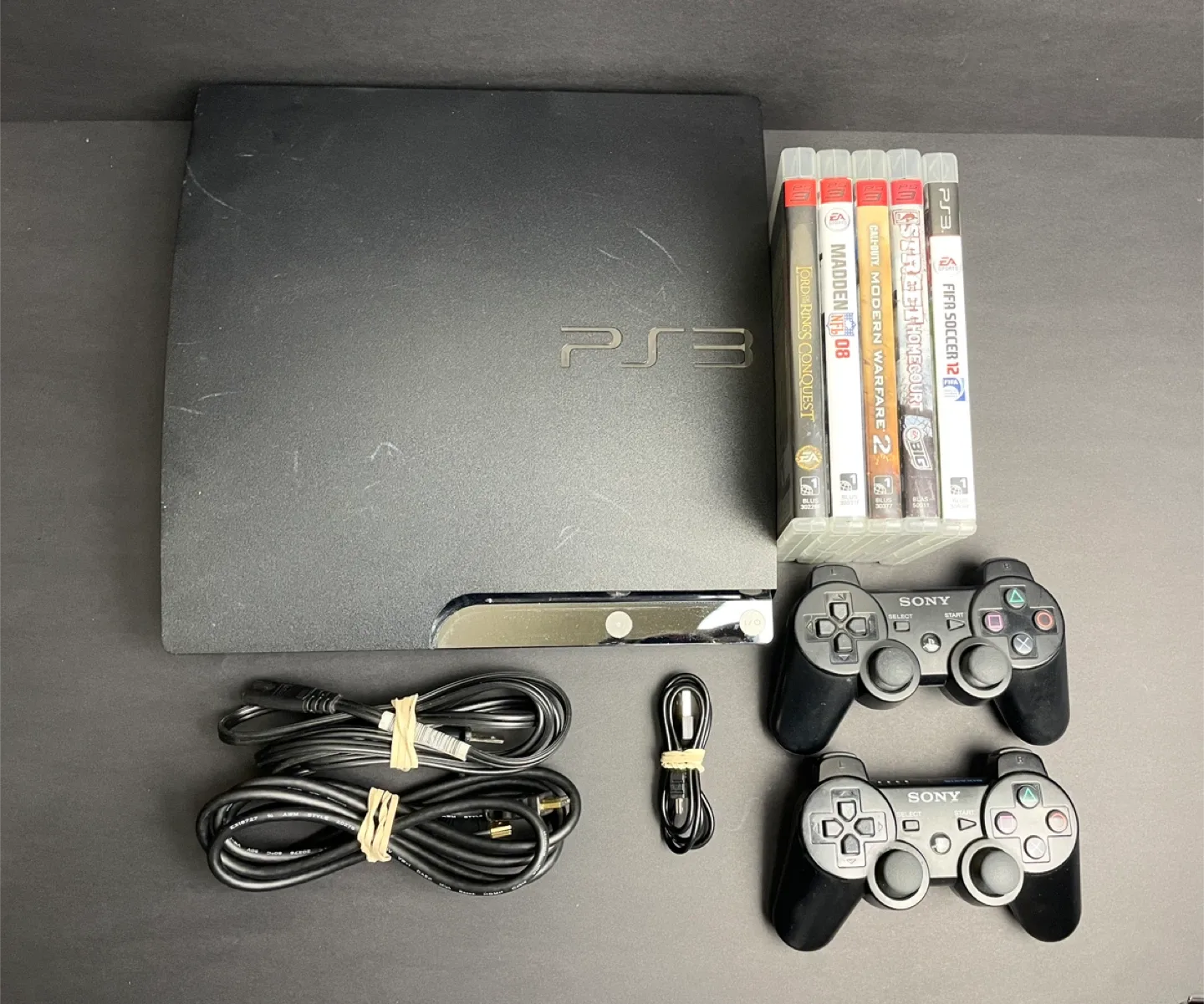 Sony PlayStation 3 (PS3) Console with 5 Games & 2 Controllers