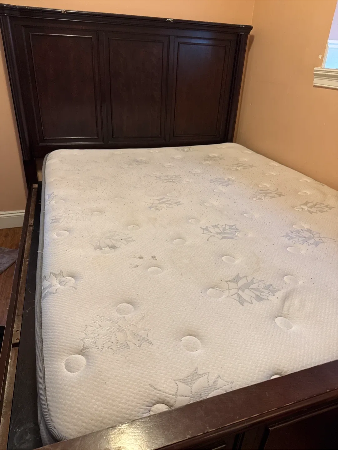Bed with queen sized mattress