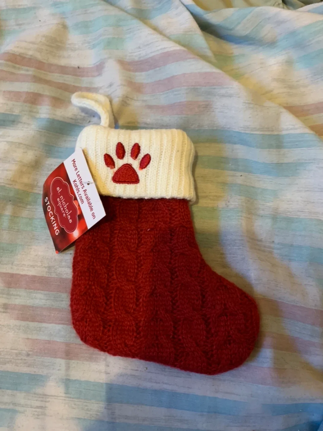 St. Nicholas Square Red Paw Print Christmas Stocking