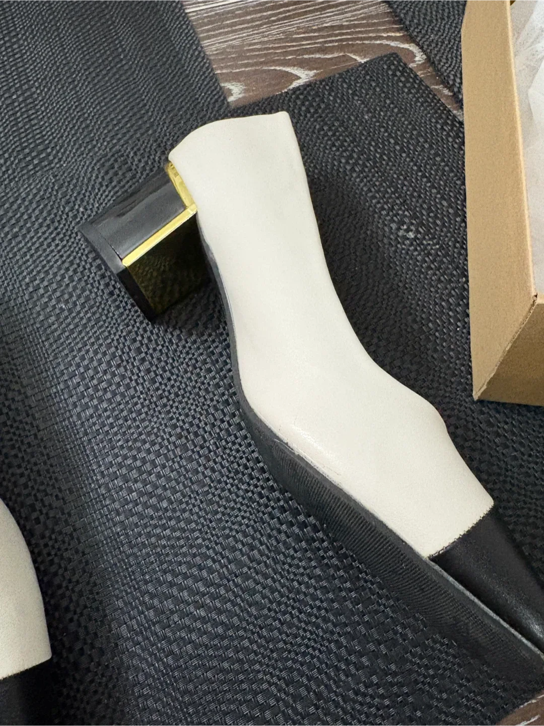 White and black pumps with block hee