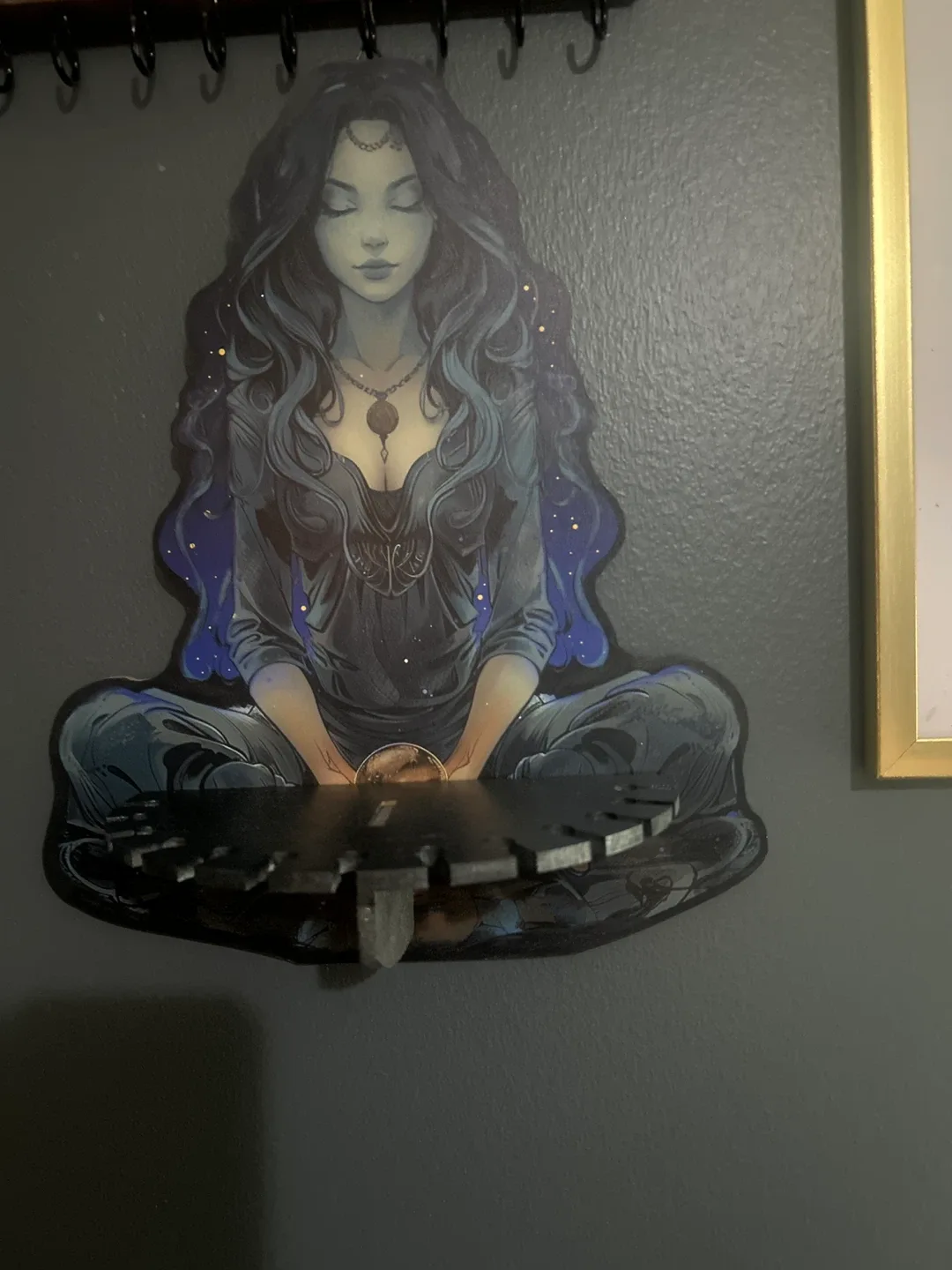 Wall shelf with fantasy art