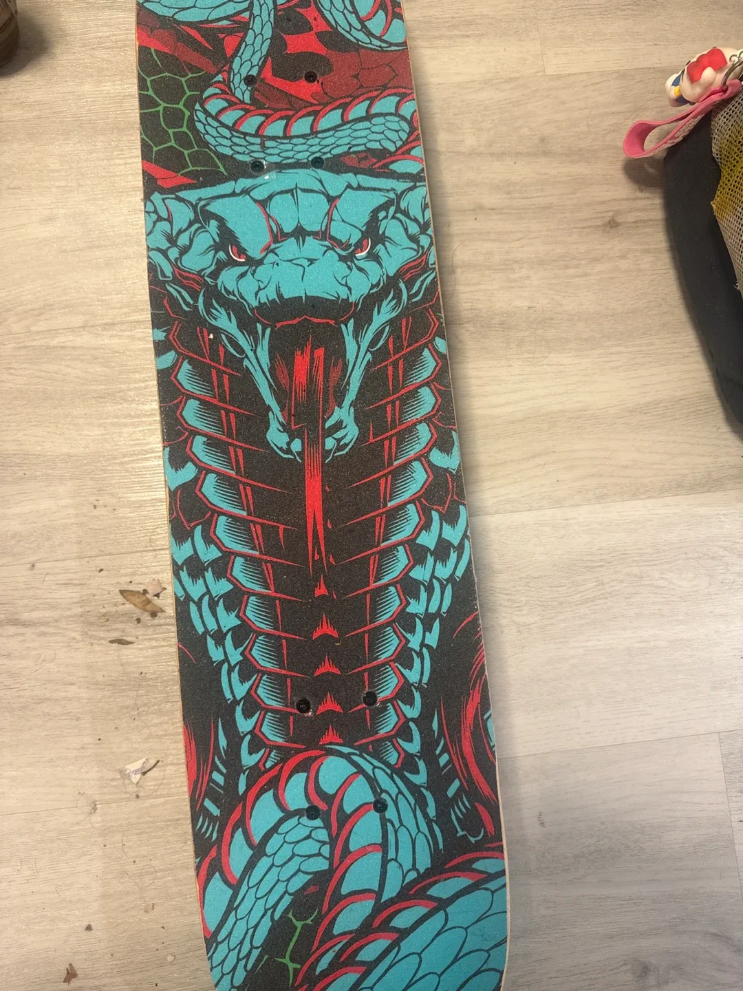 Used Snake Graphic Skateboard