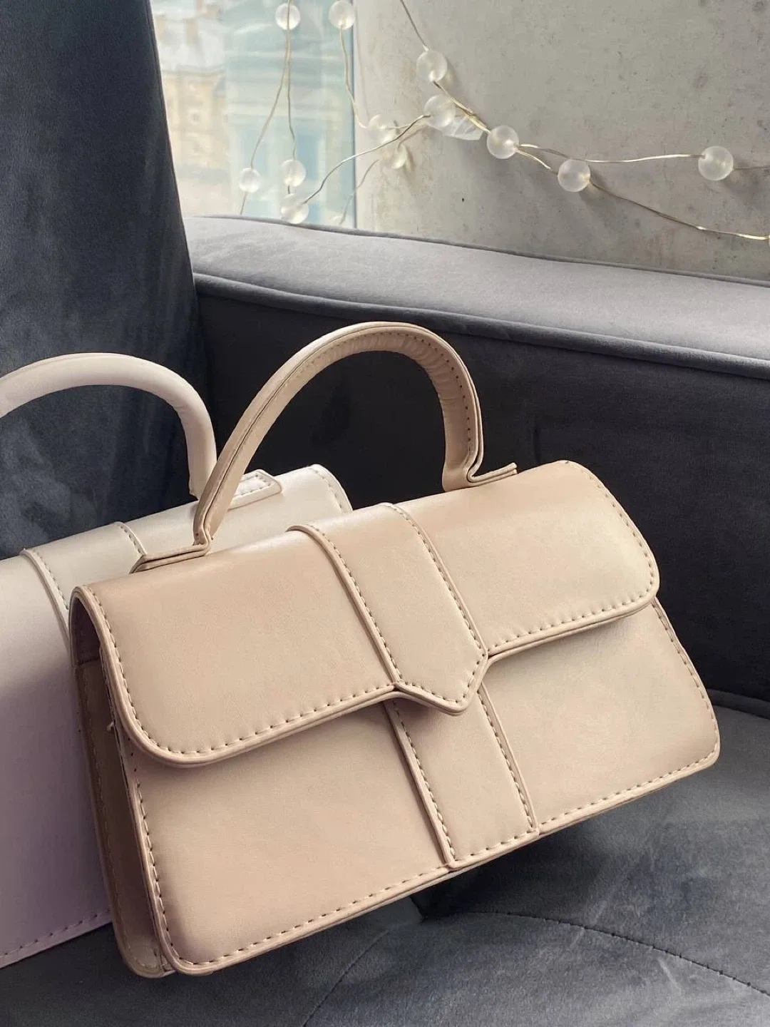 Beige minimalist top handle flap square bag image indicator(6)