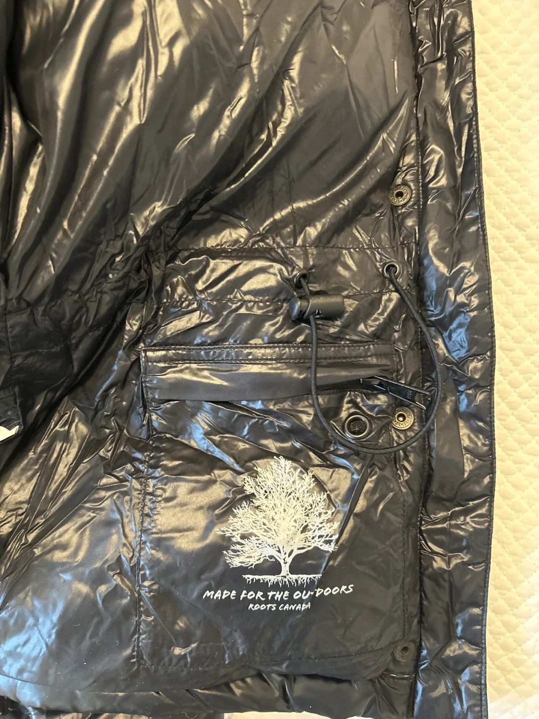 Roots puffer jacket. image indicator(4)