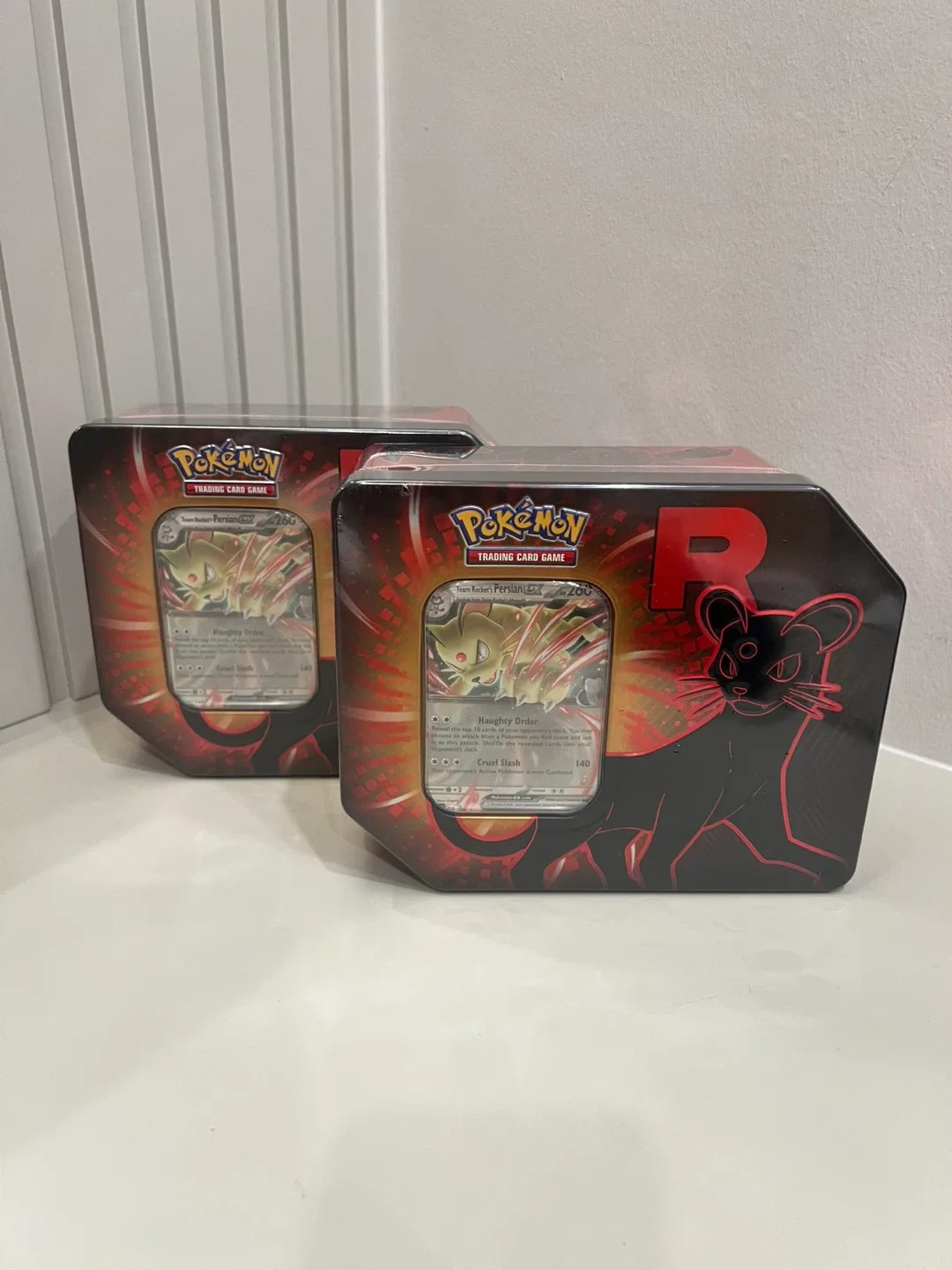 Pokémon TCG: Team Rocket Tin image indicator(2)
