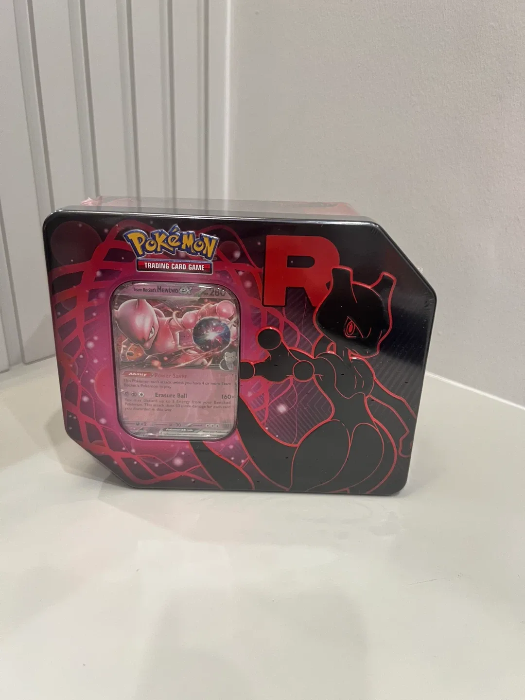 Pokémon TCG: Team Rocket Tin image indicator(3)
