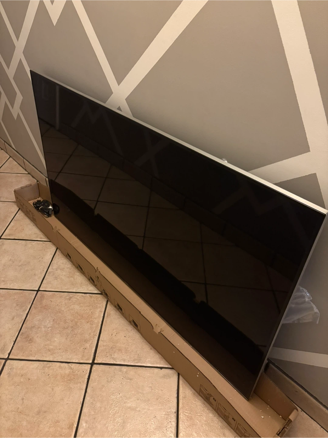 Samsung 65” LED flat-screen TV