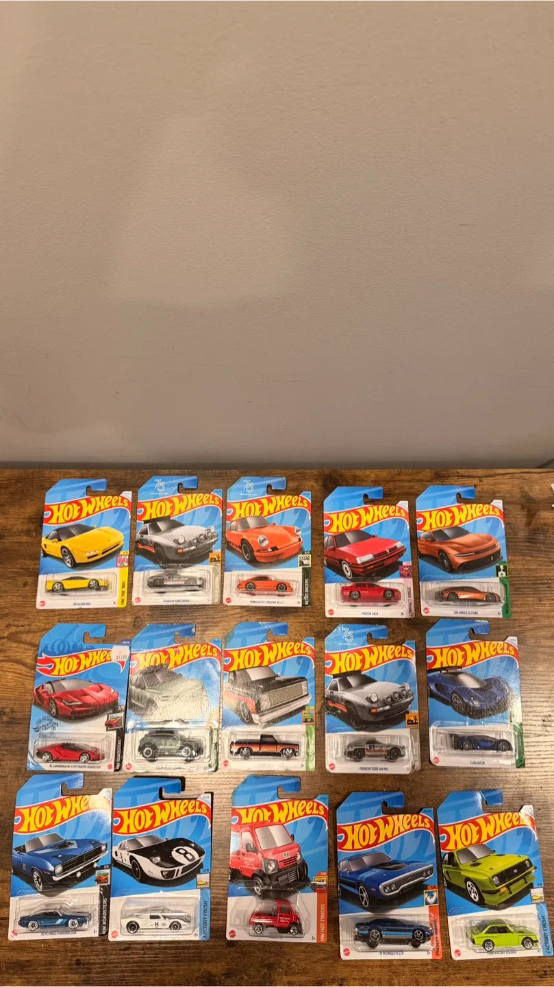 Variety of Hot Wheels and Mini GT Diecast Cars