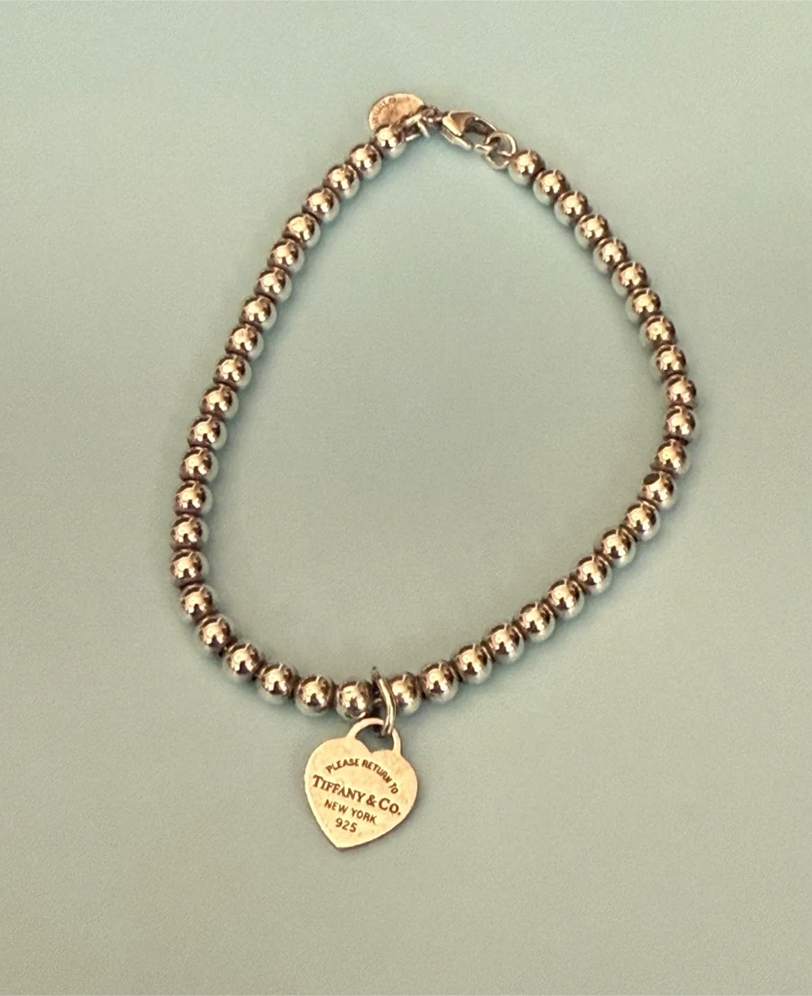 Tiffany & Co. Silver Bead Bracelet w/ Heart Charm image indicator(2)