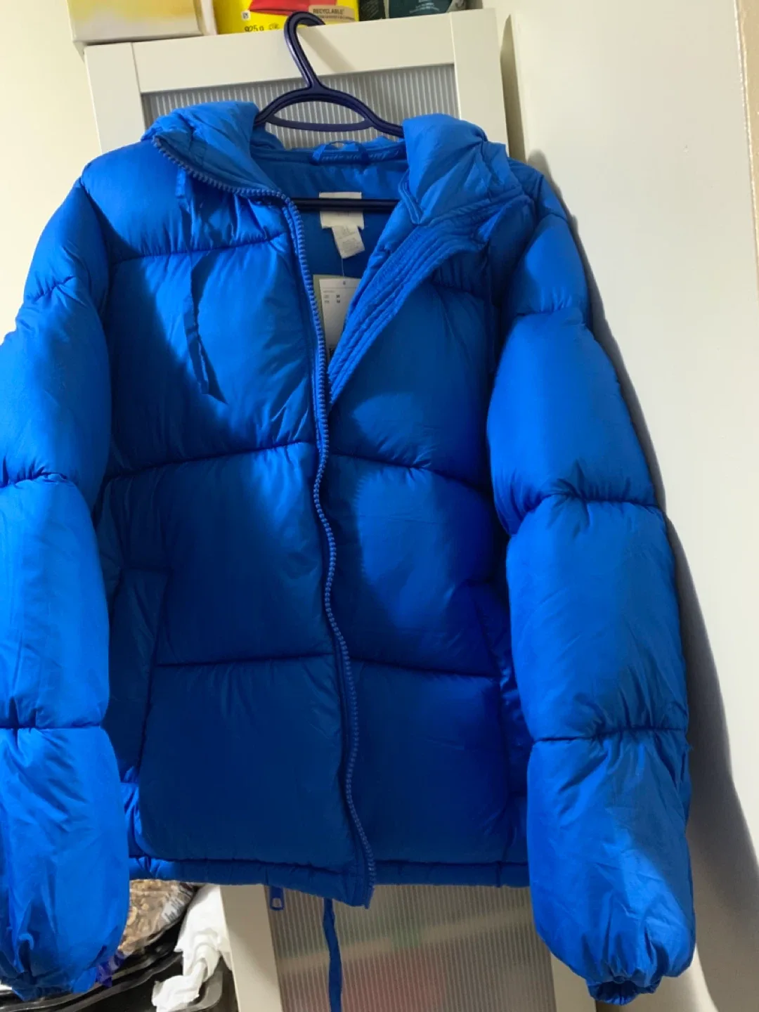 H&M Blue Puffer Jacket, brand new, medium size moving sales