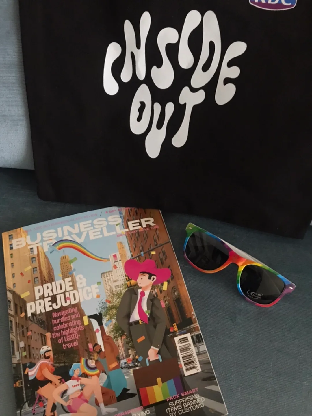 Large TOTE+Sunglasses+Large Fan+LGBTBusiness Travel Mag image indicator(2)
