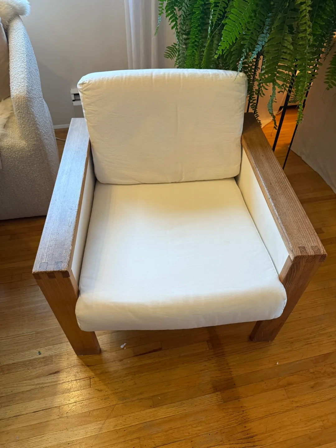 Wood Frame Armchair with White Cushions
