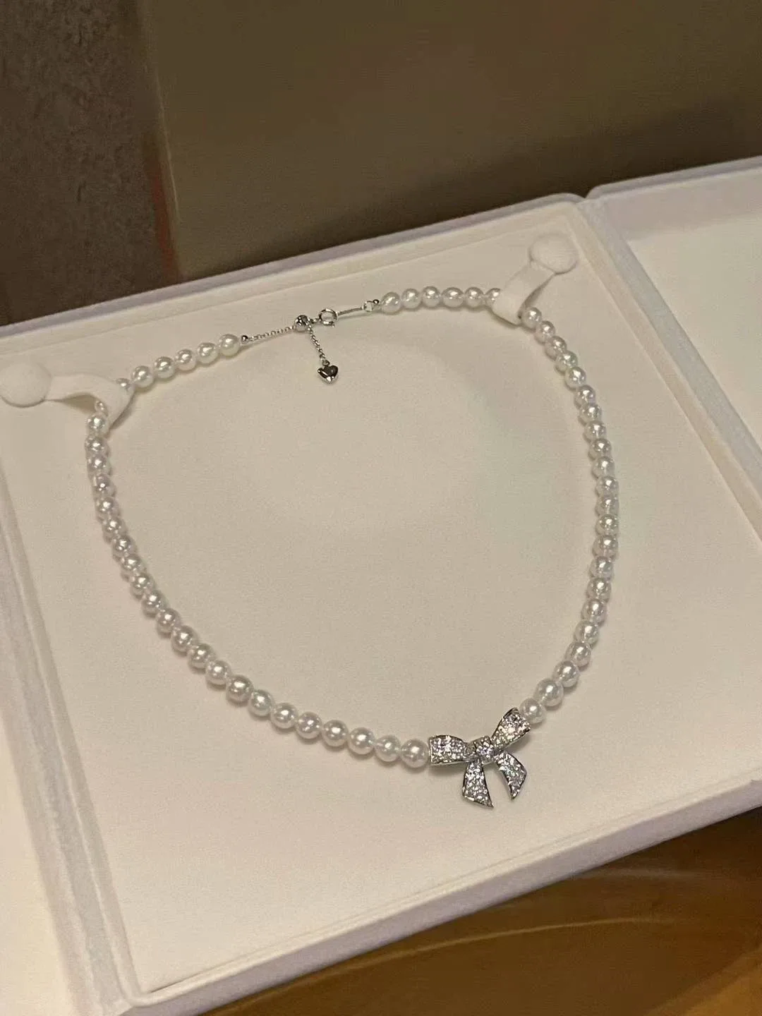 Pearl Necklace with Bow Pendant