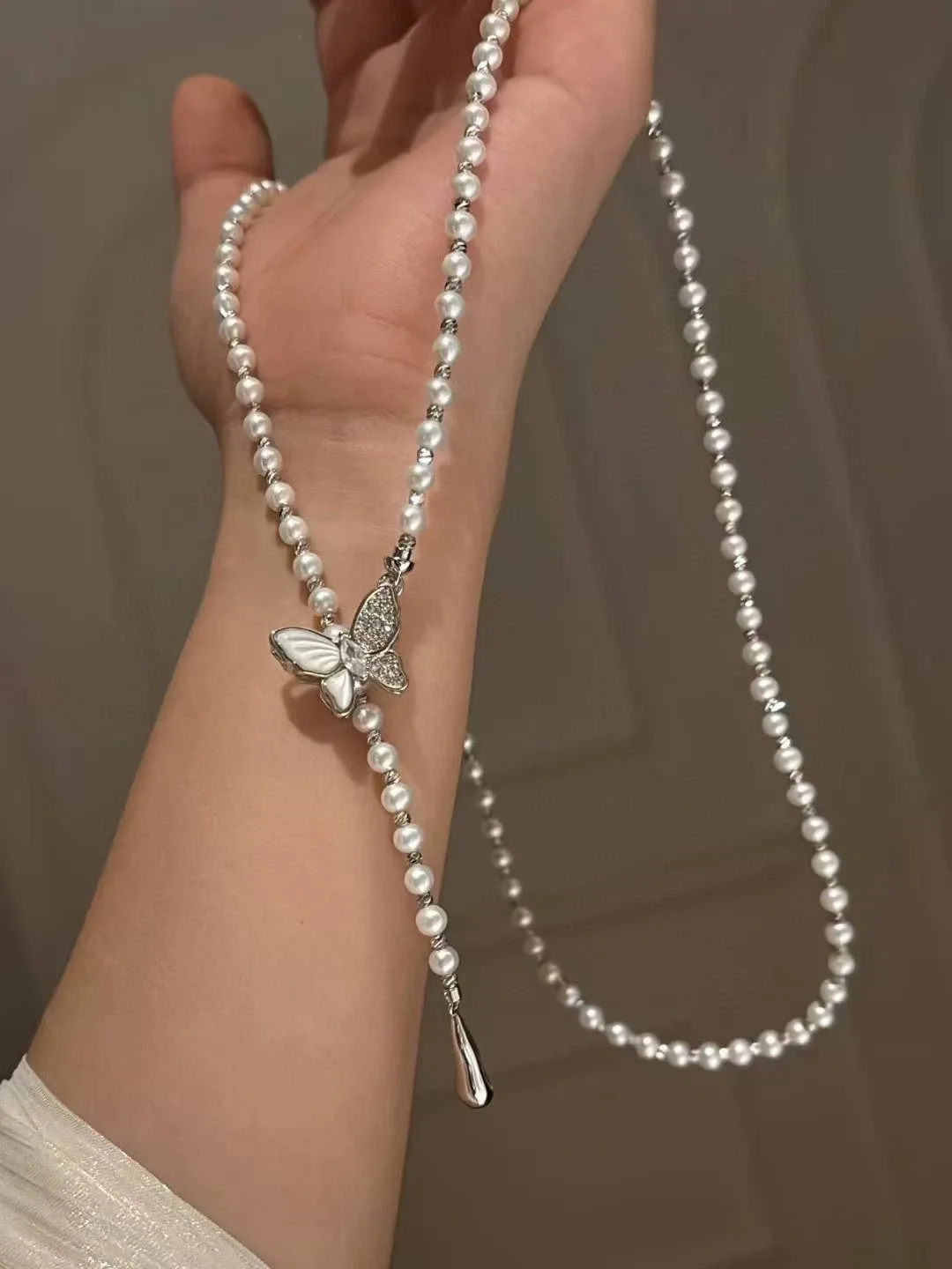 Pearl Necklace with Butterfly Pendant