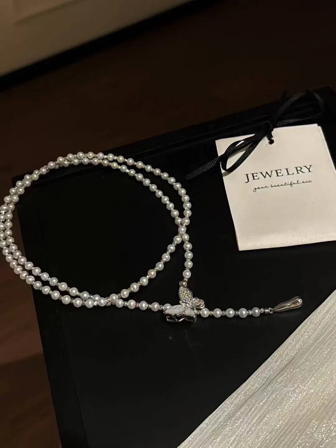 Pearl Necklace with Butterfly Pendant image indicator(3)